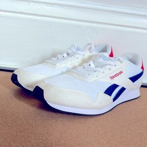 White, blue, and red Reebok tennis shoes/sneakers